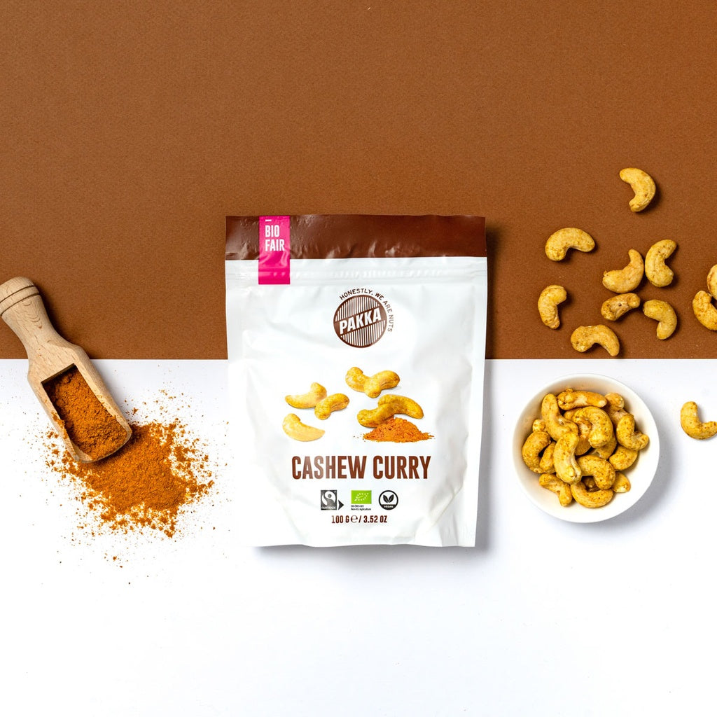 PAKKA BIO Gewürzte Cashews mit Curry Madras, Salz und Malabar Pfeffer - 100g