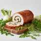 Ganze ofenfrische Porchetta aus regionalem Schweizer Fleisch für Catering in Aargau.